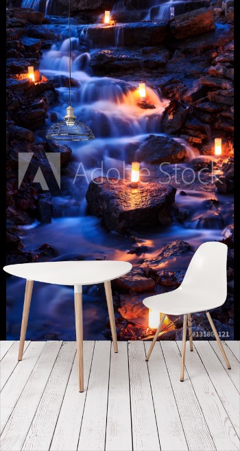 Picture of Waterfall with Multiple Candles at Twilight